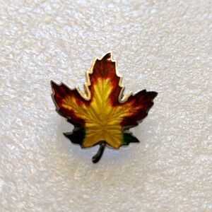BM Co. Sterling Maple leaf brooch.